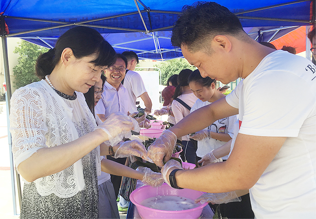 品味端午、放“粽”校园 ——阡陌物业第二届传统文化节在十所高校同时举办(图1)