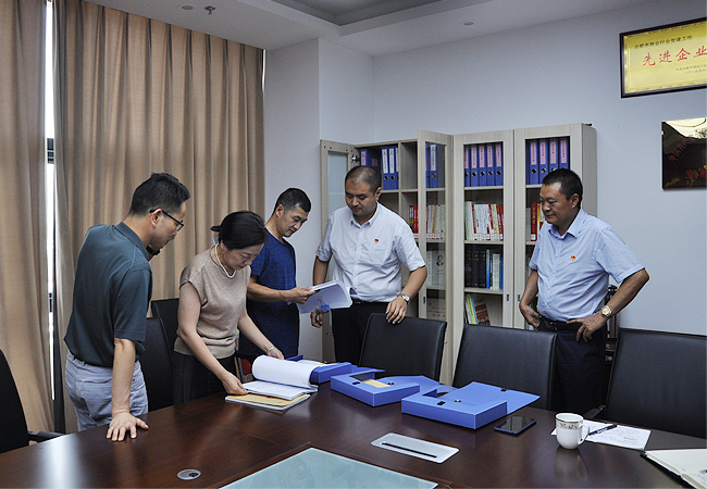 经开区房地产管理中心、海恒社区管委会领导莅临我司检查指导党建工作(图4)